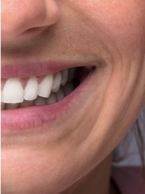 Gentle lift in surface stains over time.